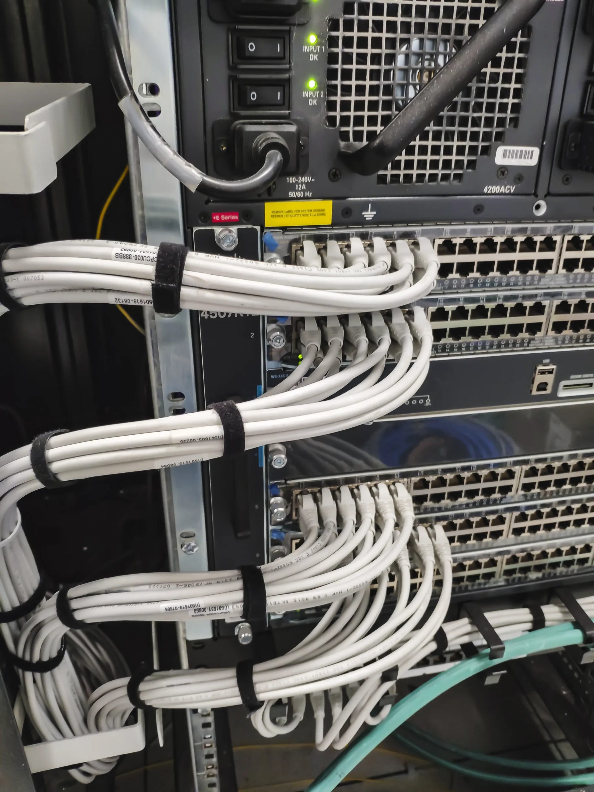 Examples of using cable ties, channels, and sleeves for cable management