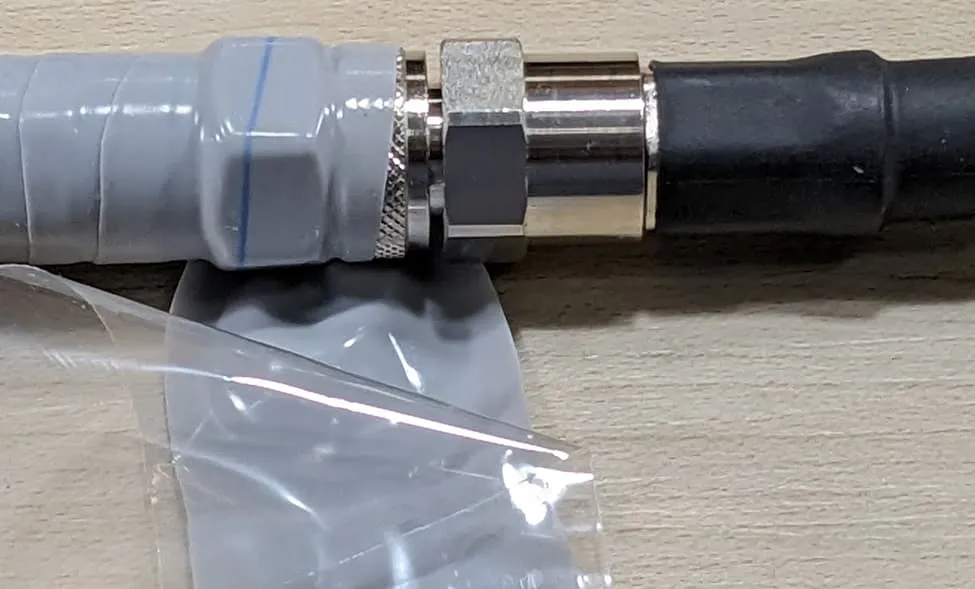 Outdoor RF cable waterproofing with protective sealing material Outdoor RF cable waterproofing with protective sealing material