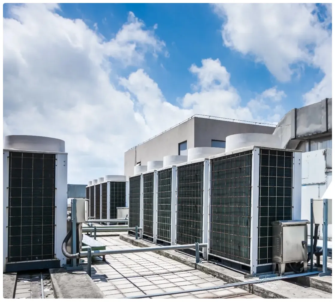 Outdoor Rooftop Environment (Long Cable Runs) Rooftop outdoor equipment environment with cable trays, illustrating long RF cable runs and weather exposure