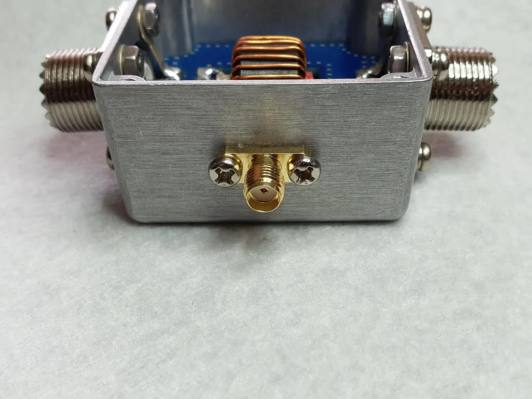 Example application of an SMA flange connector mounted with screws in a high-vibration environment.