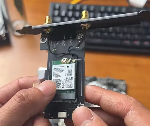 A right-angle SMA connector relieving mechanical stress in a tight enclosure by changing the cable path.