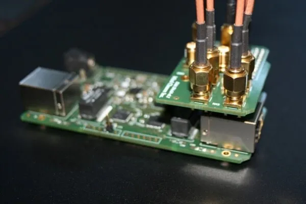 SMA male to female adapter with short coaxial pigtail SMA male to female adapter with short coaxial pigtail