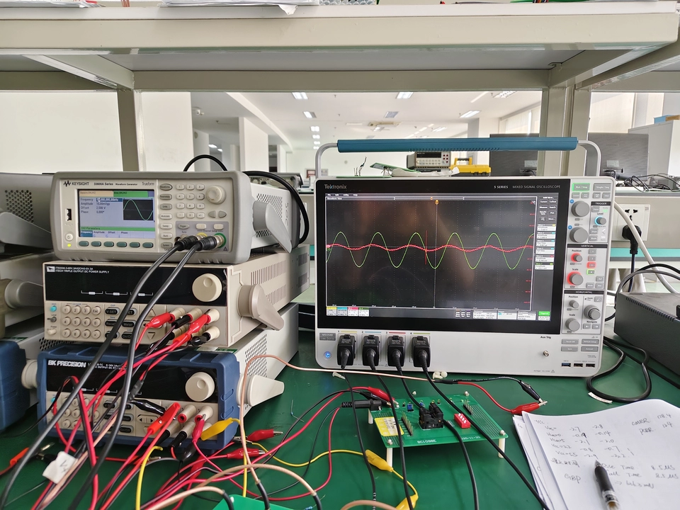 SMA to BNC adapter in use on a lab bench connecting test equipment
