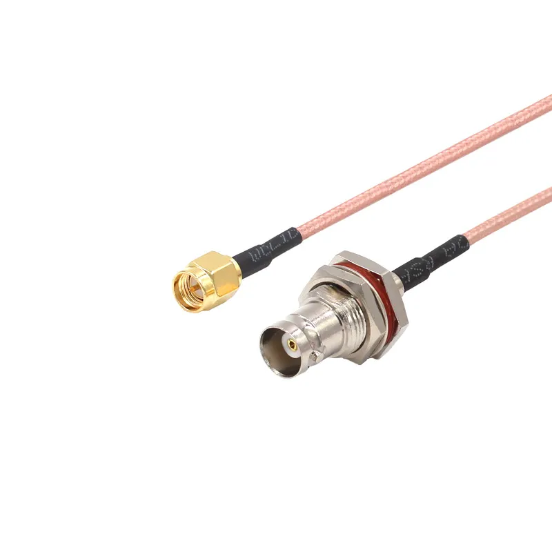 Installing a waterproof SMA bulkhead extension cable through an outdoor enclosure panel, compressing the O-ring seal