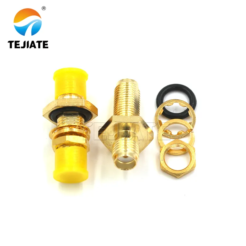 Product photo of an SMA Bulkhead (thru-panel) connector. Product photo of an SMA Bulkhead (thru-panel) connector.