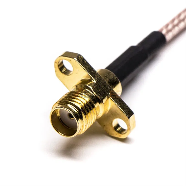 Photograph of a completed coaxial cable assembly with an MMCX male connector on one end and an SMA female connector on the other. Photograph of a completed coaxial cable assembly with an MMCX male connector on one end and an SMA female connector on the other.