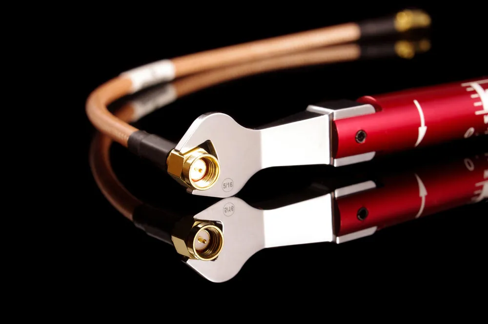 An SMA to BNC adapter permanently attached to the SMA port of an SDR (Software Defined Radio) board as a protective "plug-saver". An SMA to BNC adapter permanently attached to the SMA port of an SDR (Software Defined Radio) board as a protective "plug-saver".