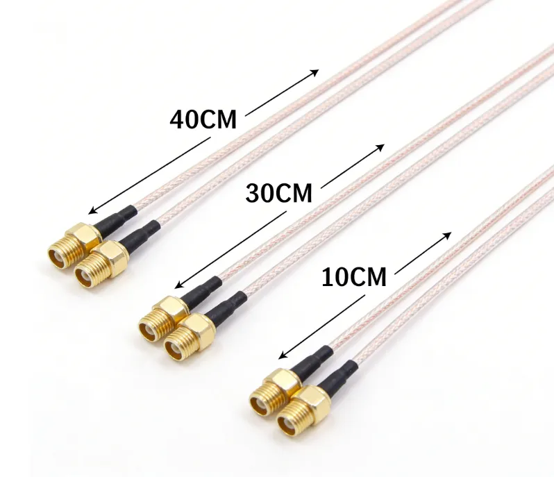 Three SMA cables of different lengths (e.g., 10cm, 30cm, 40cm) laid side by side. Three SMA cables of different lengths (e.g., 10cm, 30cm, 40cm) laid side by side.