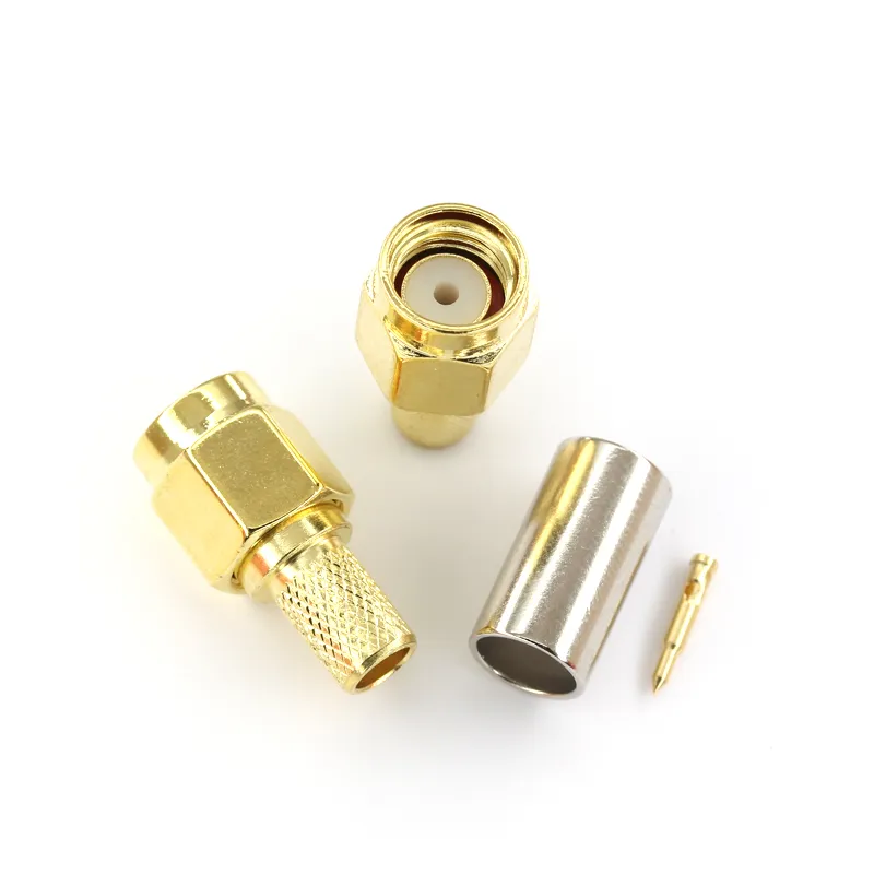 Close-up, detailed photograph of an SMA male connector, showing its threads, center pin, and insulator. Close-up, detailed photograph of an SMA male connector, showing its threads, center pin, and insulator.