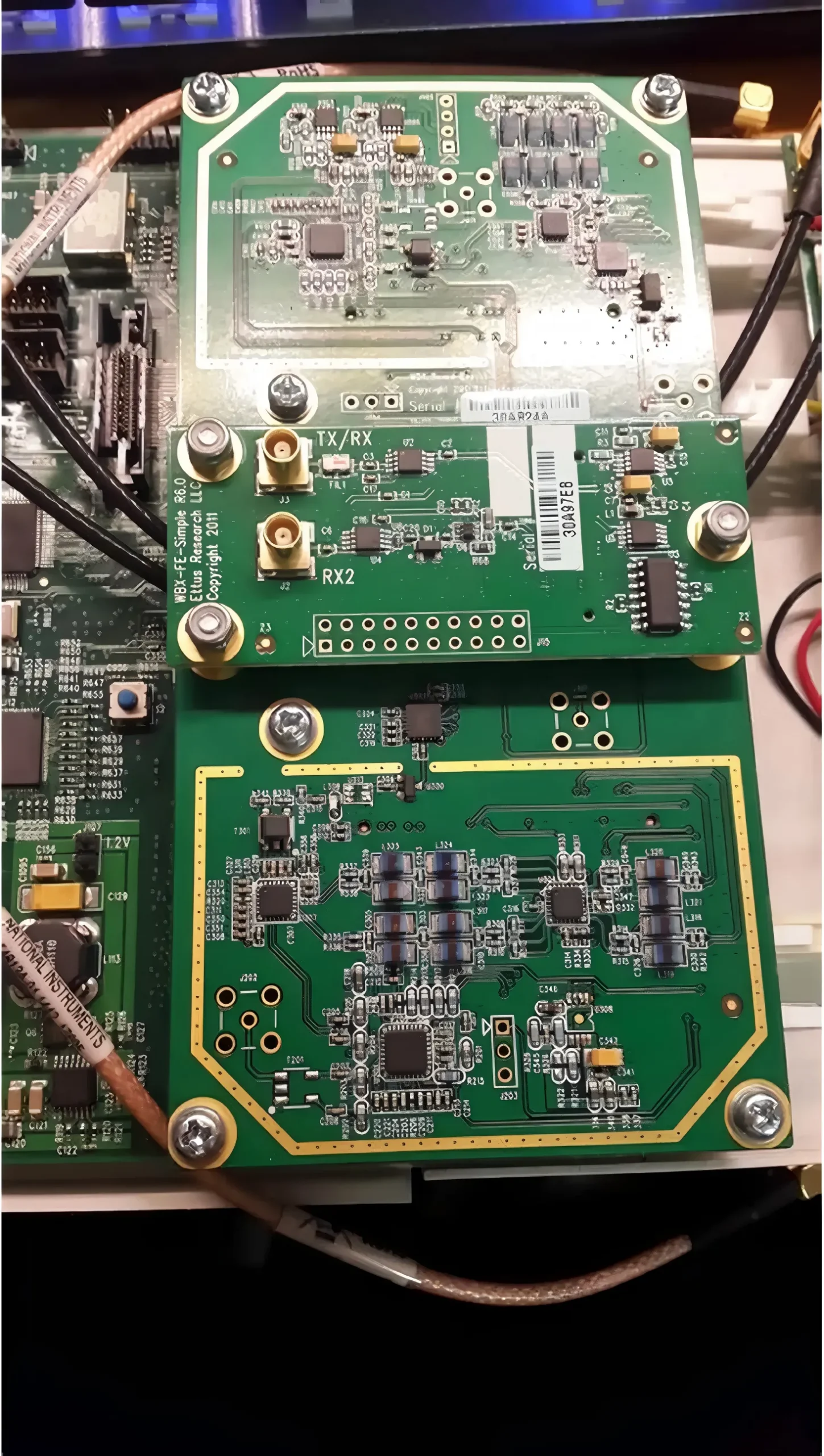 A system architecture schematic showing how the SMP connector serves as an internal interface, positioned between sensitive RF blocks such as PA and filter modules, shielded RF daughtercards and baseband boards, or stacked RF mezzanine boards. A system architecture schematic showing how the SMP connector serves as an internal interface, positioned between sensitive RF blocks such as PA and filter modules, shielded RF daughtercards and baseband boards, or stacked RF mezzanine boards.