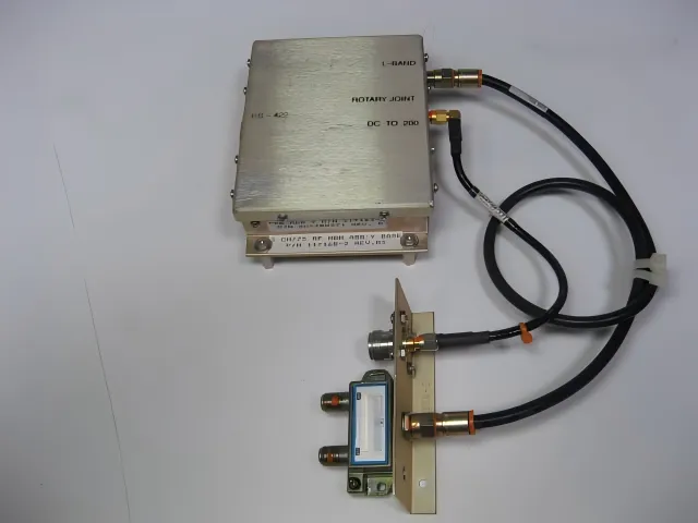 Diagram showing proper strain relief: a cable anchored to the enclosure with a clip, preventing load from reaching the connector Diagram showing proper strain relief: a cable anchored to the enclosure with a clip, preventing load from reaching the connector