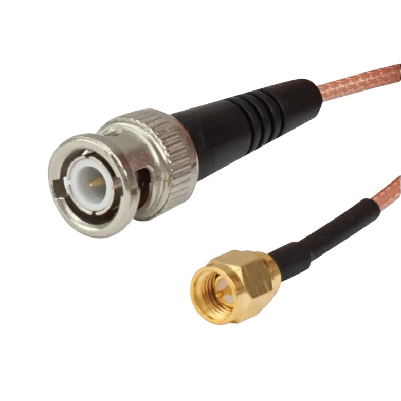 Photograph of a finished SMA to BNC cable assembly, with SMA connector on one end and BNC connector on the other Photograph of a finished SMA to BNC cable assembly, with SMA connector on one end and BNC connector on the other