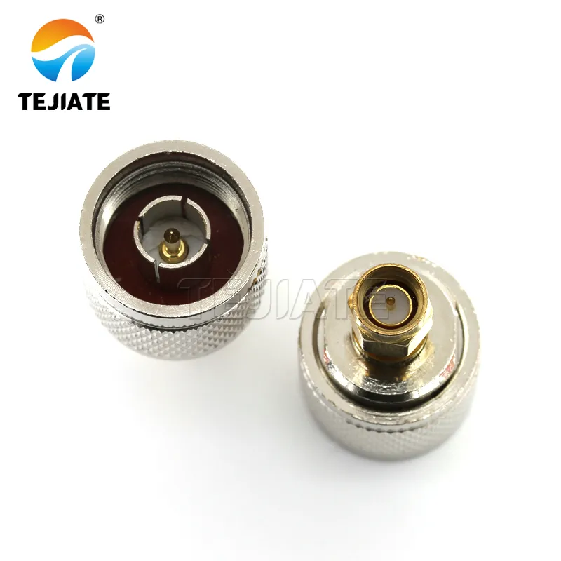 Photograph of a rigid SMA to N adapter with male SMA on one end and female N on the other Photograph of a rigid SMA to N adapter with male SMA on one end and female N on the other