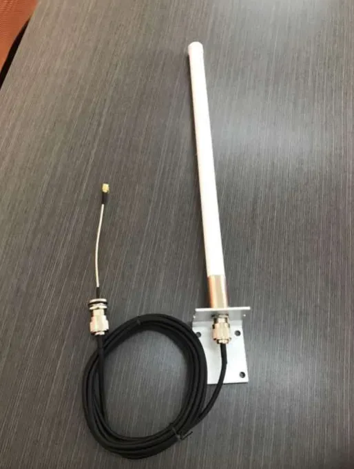 Close-up of an SMA to N connector showing threads, center conductor, and coupling nut Close-up of an SMA to N connector showing threads, center conductor, and coupling nut