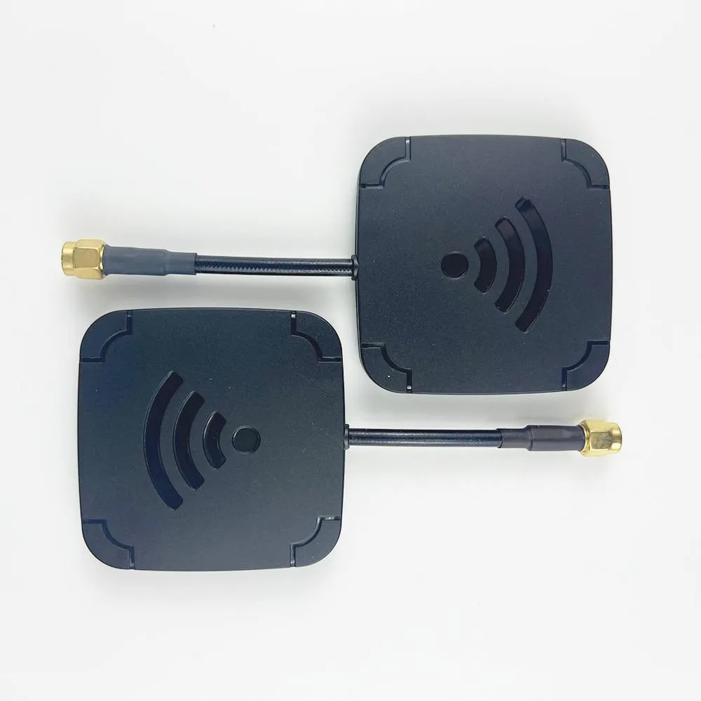 Photograph of a patch antenna mounted on a tripod at a suitable height, with clear line-of-sight to the flight area Photograph of a patch antenna mounted on a tripod at a suitable height, with clear line-of-sight to the flight area