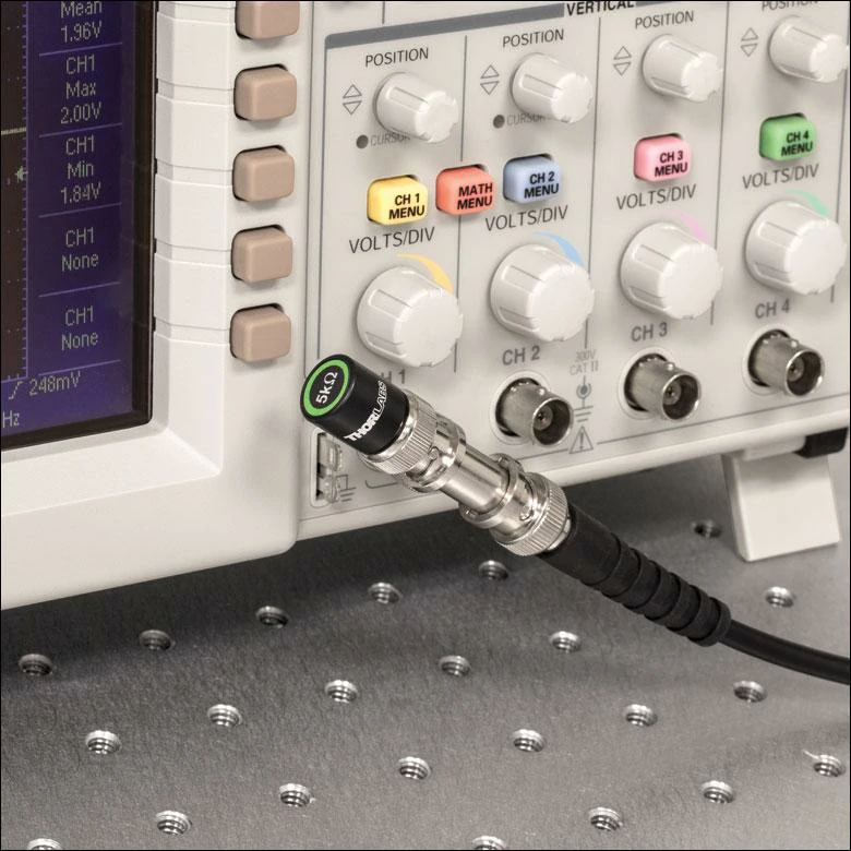 BNC adapter and coaxial cable connected to an oscilloscope input BNC adapter and coaxial cable connected to an oscilloscope input