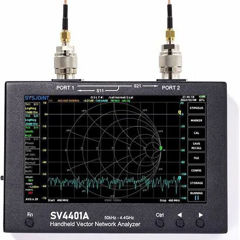 Handheld vector network analyzer connected for S11 and S21 RF measurements Handheld vector network analyzer connected for S11 and S21 RF measurements