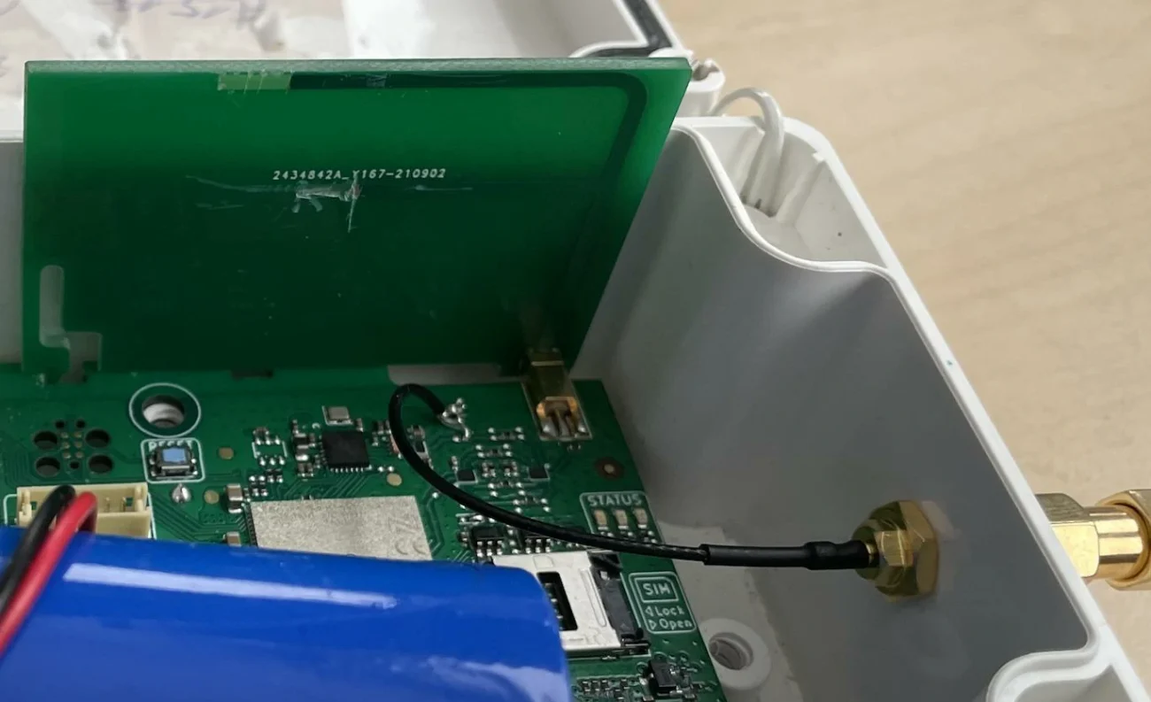 Micro coax cable connecting an internal IoT RF module to an SMA bulkhead connector Micro coax cable connecting an internal IoT RF module to an SMA bulkhead connector