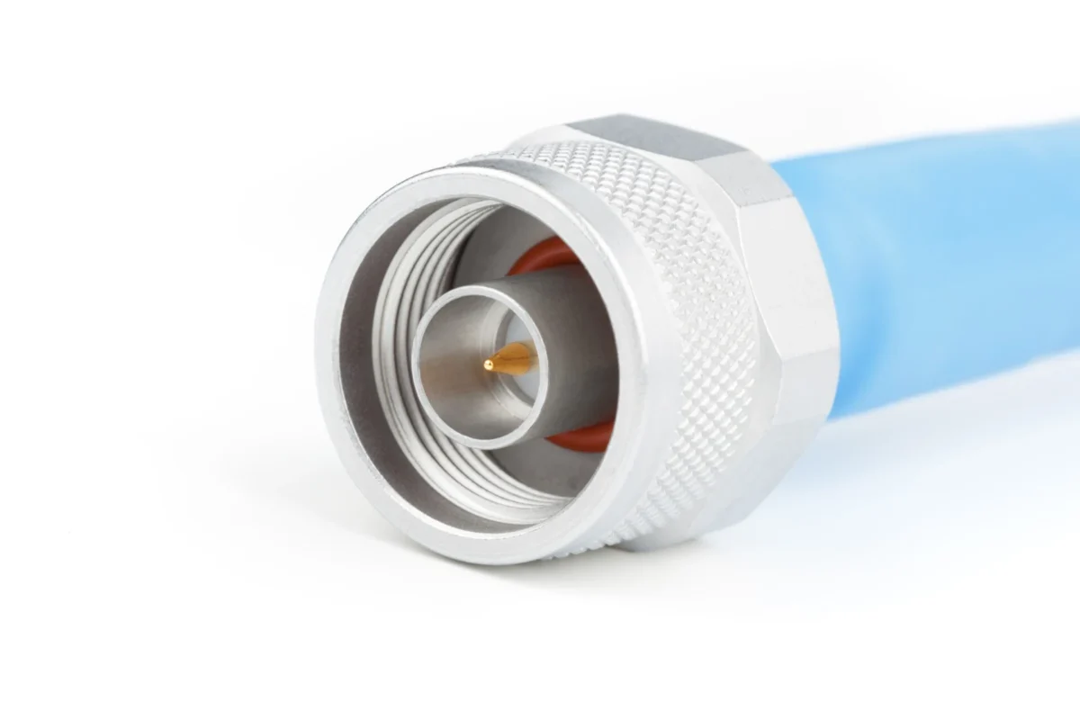 Close-up of a 50 ohm N-type male coaxial connector and blue RF cable Close-up of a 50 ohm N-type male coaxial connector and blue RF cable