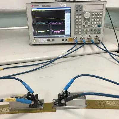 SMA adapter connecting an RF circuit board to a portable vector network analyzer SMA adapter connecting an RF circuit board to a portable vector network analyzer