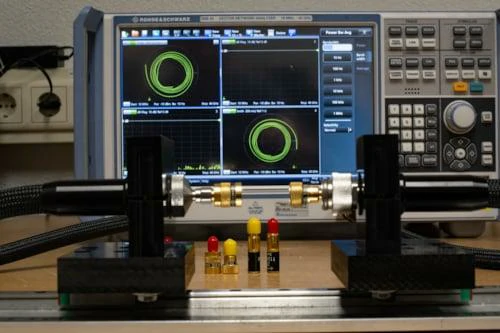 SMA adapter connected to vector network analyzer for RF performance testing SMA adapter connected to vector network analyzer for RF performance testing