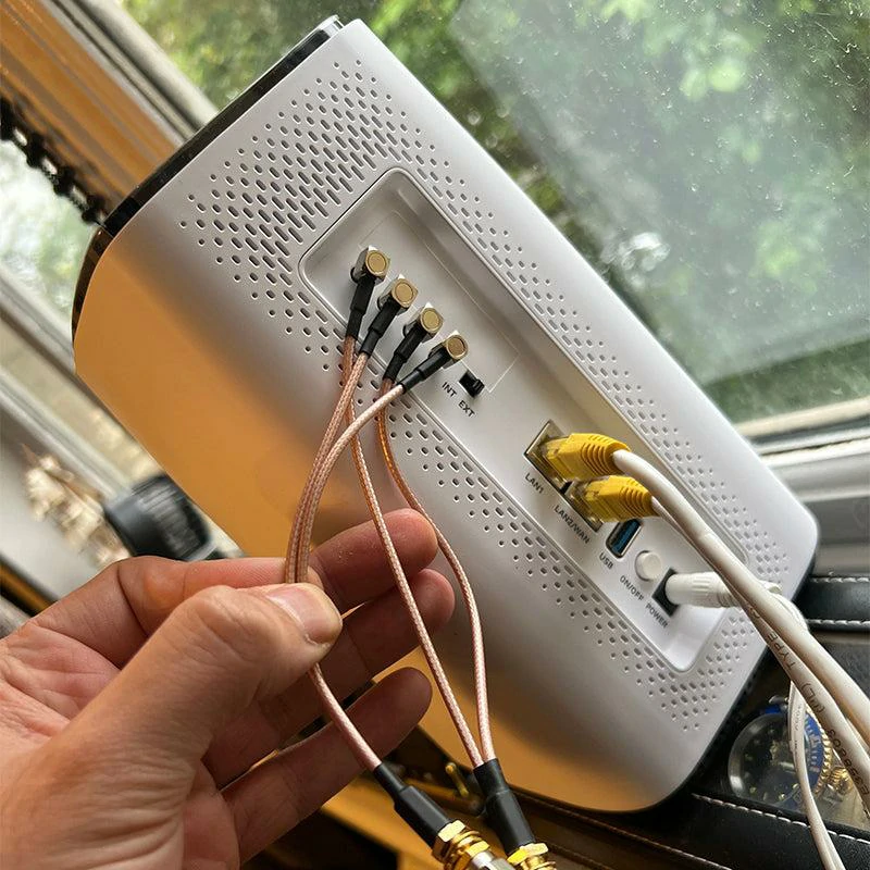 Coaxial antenna cables connected to a wireless router Coaxial antenna cables connected to a wireless router