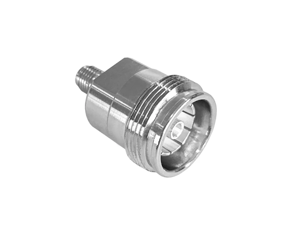 Straight 4.3-10 female to SMA female RF adapter on a white background Straight 4.3-10 female to SMA female RF adapter on a white background