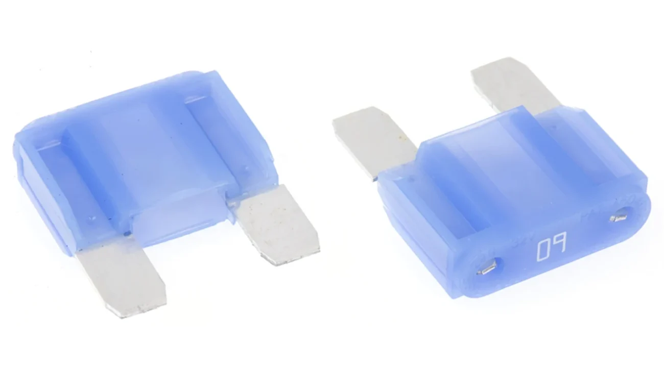 Blue 60A MAXI blade fuse shown from two angles for automotive high-current fuse identification Blue 60A MAXI blade fuse shown from two angles for automotive high-current fuse identification