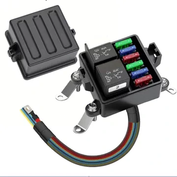 Compact automotive fuse and relay box with blade fuses, relays, mounting brackets and color-coded wiring harness. Compact automotive fuse and relay box with blade fuses, relays, mounting brackets and color-coded wiring harness.