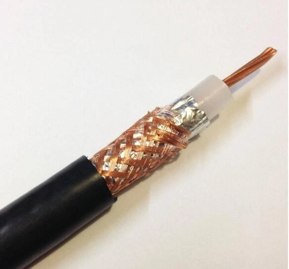 Cross section of coaxial cable showing center conductor dielectric shield and outer jacket layers Cross section of coaxial cable showing center conductor dielectric shield and outer jacket layers