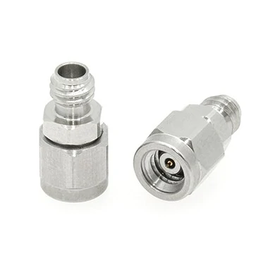 Two compact cross-series coax adapters for connecting different RF connector interfaces Two compact cross-series coax adapters for connecting different RF connector interfaces