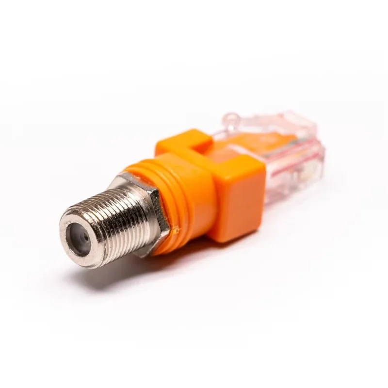 Orange F-type female coaxial connector to RJ45 plug adapter on a white background Orange F-type female coaxial connector to RJ45 plug adapter on a white background