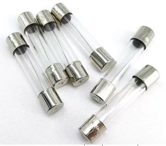 Glass tube fuses with transparent bodies and metal terminals for electrical applications Glass tube fuses with transparent bodies and metal terminals for electrical applications