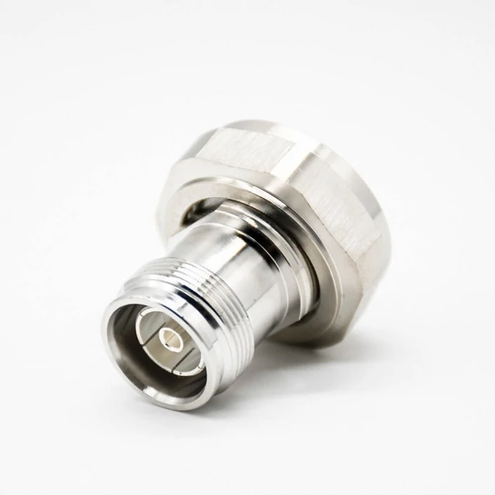 Close-up of a 4.3-10 to N adapter showing the threaded interface, center contact and hex coupling body Close-up of a 4.3-10 to N adapter showing the threaded interface, center contact and hex coupling body