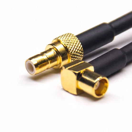 Right angle RF coaxial cable connectors showing cable exit direction and bend control Right angle RF coaxial cable connectors showing cable exit direction and bend control