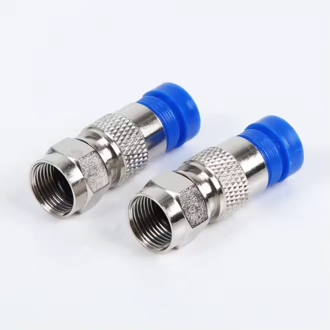 Two RG6 compression F connectors with blue sealing sleeves for coaxial cable installation Two RG6 compression F connectors with blue sealing sleeves for coaxial cable installation