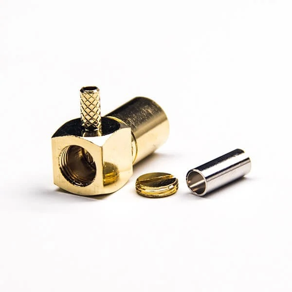 Disassembled right-angle SMB cable connector with contact, ferrule and rear hardware Disassembled right-angle SMB cable connector with contact, ferrule and rear hardware