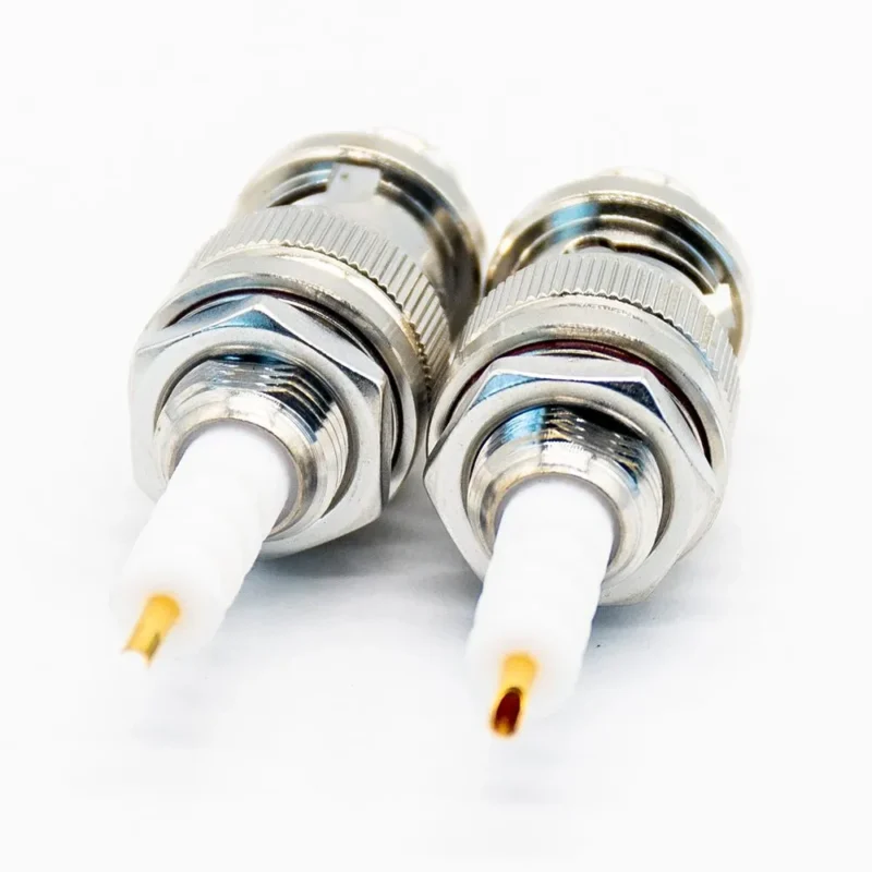 Two SHV bulkhead connectors with insulated center contacts and threaded panel mounting Two SHV bulkhead connectors with insulated center contacts and threaded panel mounting