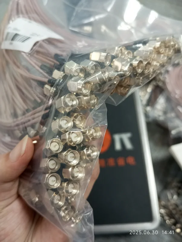 Batch of SMA male cable connectors prepared for RF cable assembly inspection Batch of SMA male cable connectors prepared for RF cable assembly inspection