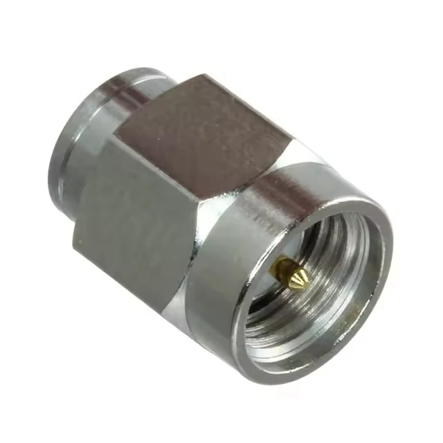 Close-up of a straight RF coax adapter showing the threaded coupling and center contact Close-up of a straight RF coax adapter showing the threaded coupling and center contact