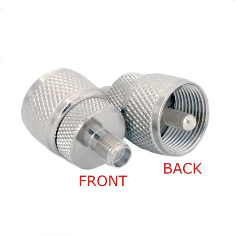 UHF male to SMA female coaxial adapter shown from front and back UHF male to SMA female coaxial adapter shown from front and back