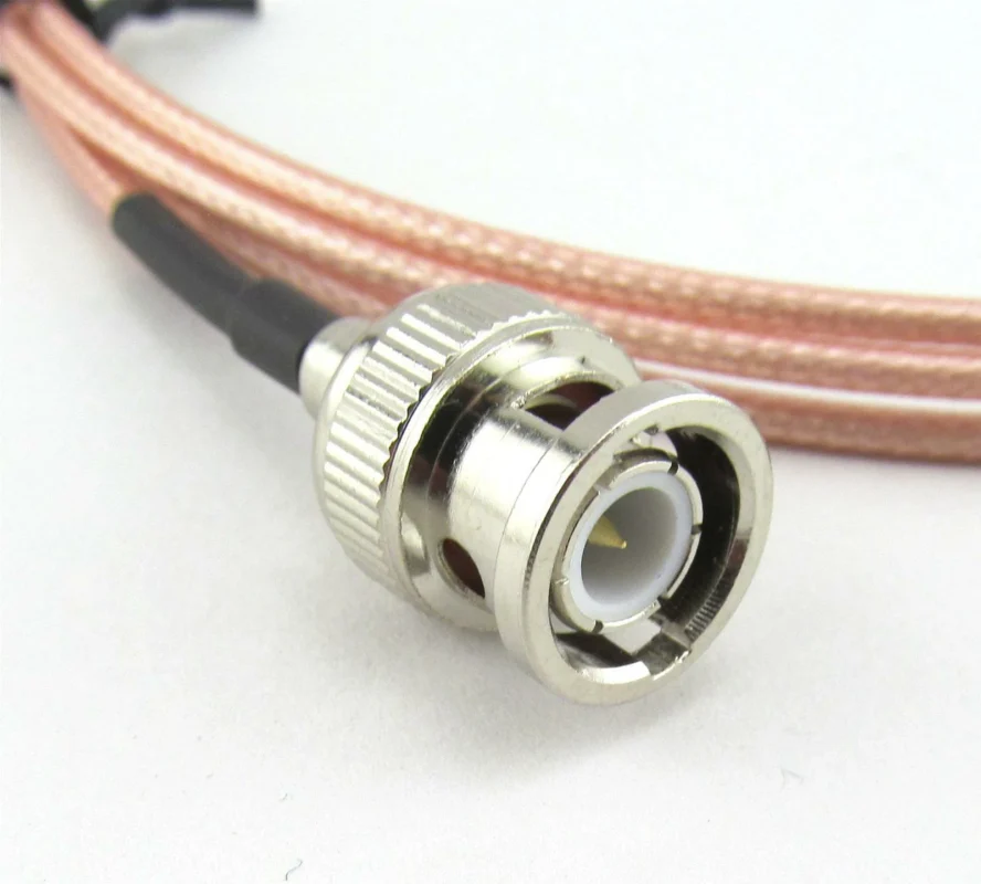 Close-up view of BNC male connector with center pin contact for coaxial cable assembly Close-up view of BNC male connector with center pin contact for coaxial cable assembly