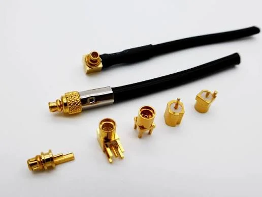 Compact RF coax connectors and antenna interface assemblies Compact RF coax connectors and antenna interface assemblies
