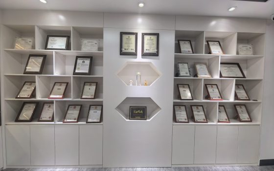 TEJTE certificate wall with framed quality and compliance documents.